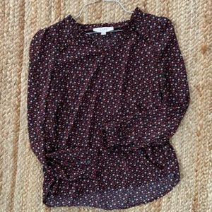 Loft Blouse with ruffle detail on neck and wrists. Size small.